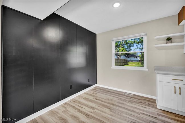Unfurnished dining area featuring light wood-style floors and recessed lighting | Image 29