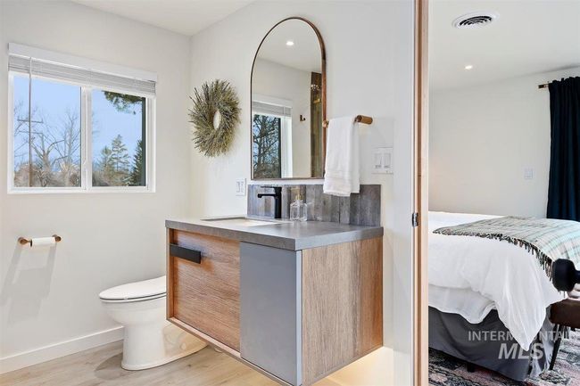 Bathroom with vanity, wood finished floors, and recessed lighting | Image 44