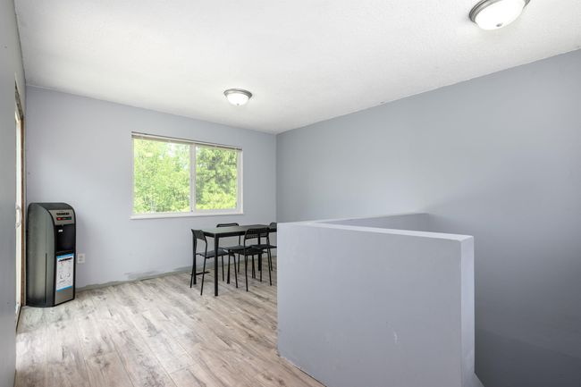 Dining room featuring wood finished floors | Image 16