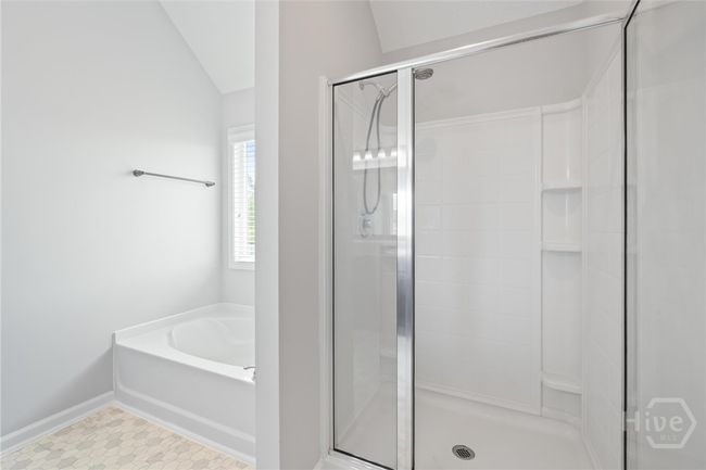 Separate relaxing garden tub. | Image 25