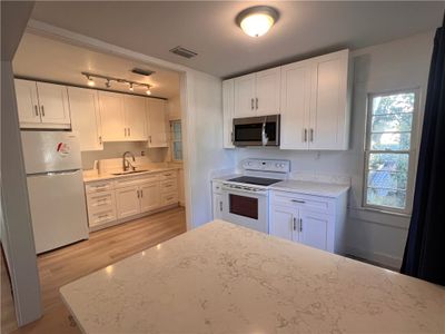 Renovated kitchen with granite countertops | Image 3