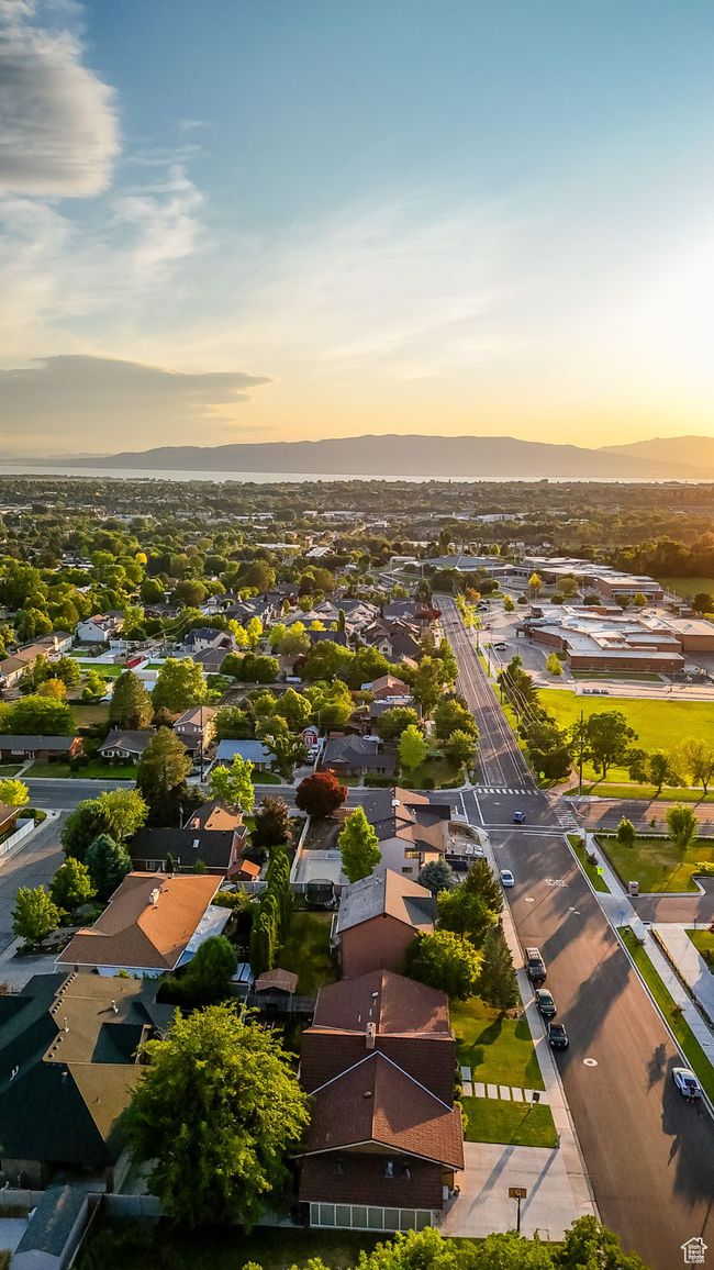 Aerial view of residential area featuring a mountainous background | Image 47
