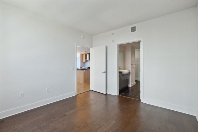 Primary bedroom towards bathroom | Image 17