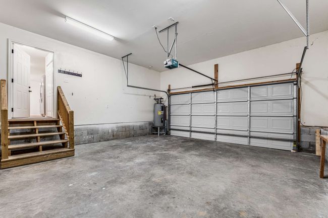 Spacious two car garage four steps from kitchen. | Image 28