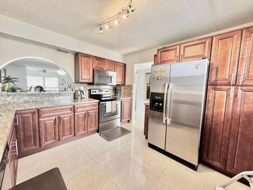 311-4975 E Sabal Palm Blvd, Tamarac, FL, 33319-2649 | Card Image