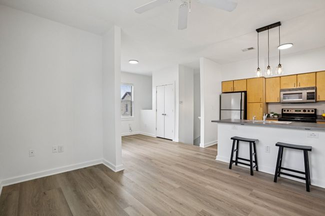 A view from the living room to the kitchen and the space that can be whatever makes you happy! | Image 18