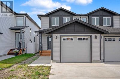 1421 Aldrich Pl, Home with 3 bedrooms, 3 bathrooms and 2 parking in Carstairs AB | Image 3