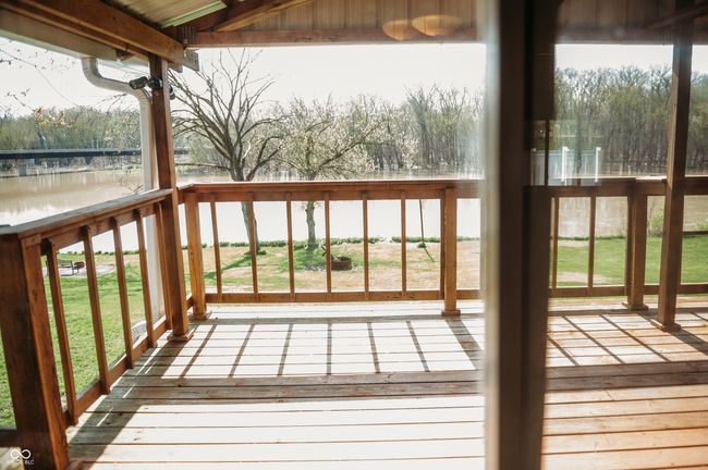 wooden deck featuring a water view | Image 26
