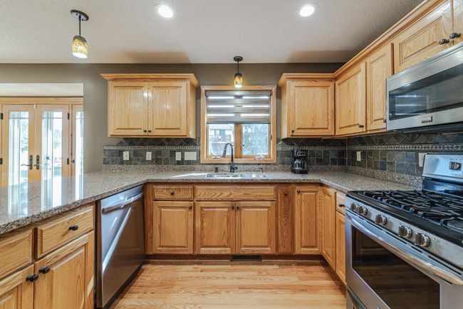 Kitchen window overlooking back yard! | Image 14