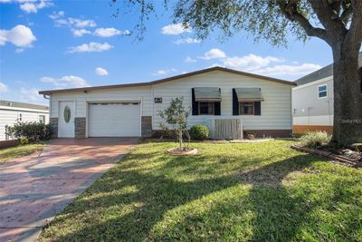 1609 Magnolia Avenue, House other with 2 bedrooms, 2 bathrooms and null parking in The Villages FL | Image 3