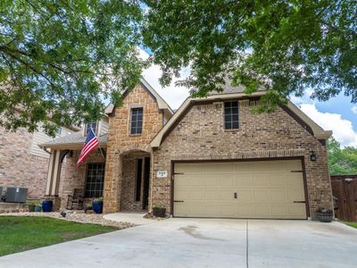 View of front of house featuring a garage | Image 1