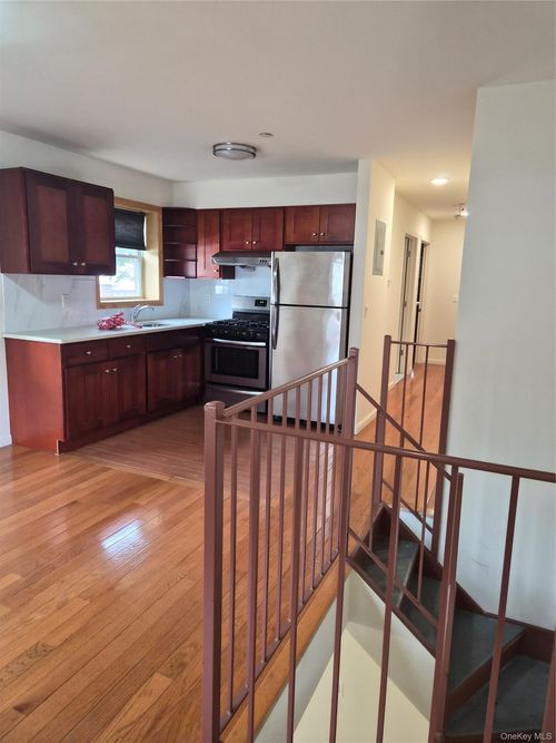 22003 64th Ave, Oakland Gardens, NY, 11364-2208 | Card Image