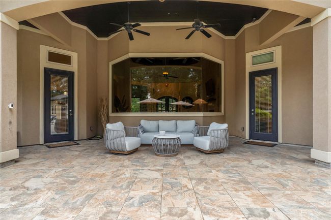 The back porch is ready for casual alfresco dining while enjoying shade and fresh air... | Image 37