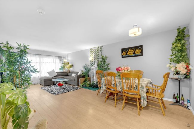 Dining room featuring baseboards and light wood-type flooring | Image 10