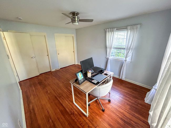 Additional bedroom with hardwood floors | Image 21