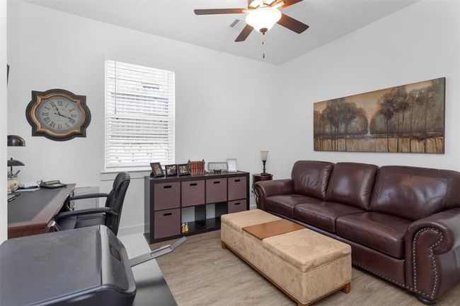 Whether you need a quiet workspace or a cozy guest room, this flexible space is ready to adapt to your lifestyle. With ample natural light and a spacious layout, it’s perfect for productivity during the day or hosting visitors overnight. Work-from-home has never felt more comfortable. | Image 31