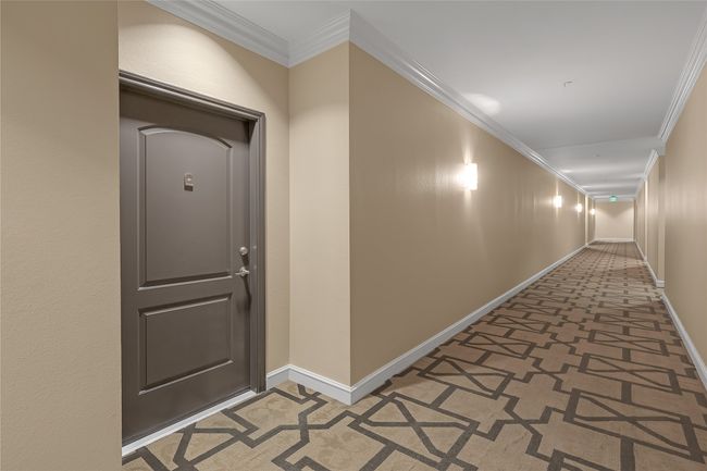 Hallway featuring crown molding | Image 22