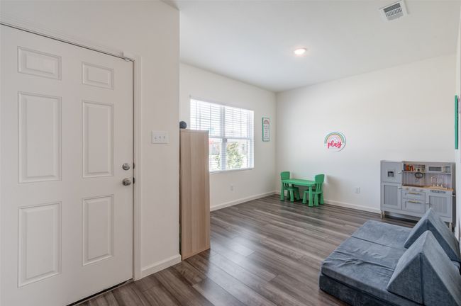 Foyer entrance featuring baseboards, wood finished floors, and recessed lighting | Image 5