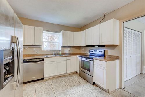 350 Sunshine Dr, Coconut Creek, FL, 33066-1817 | Card Image