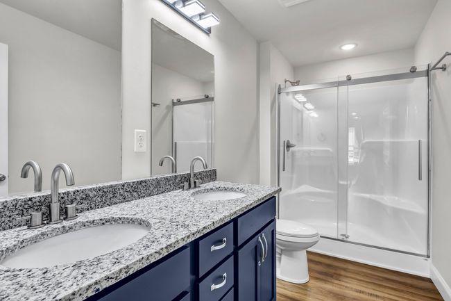 En suite bathroom in primary bedroom. | Image 15