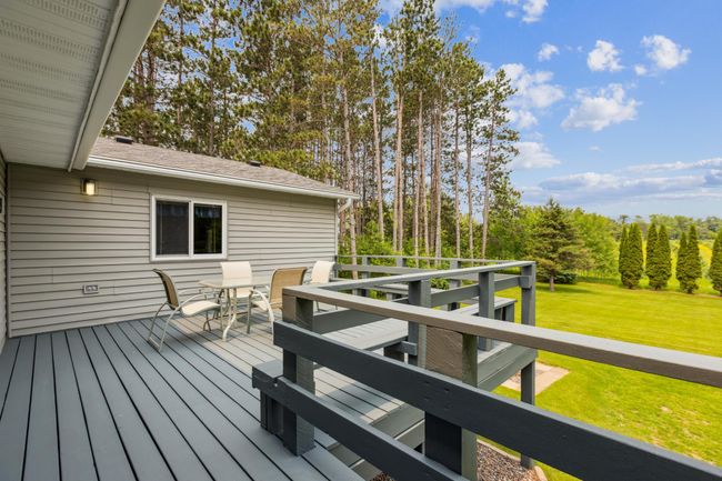 Freshly painted deck and patio furniture is included. | Image 30