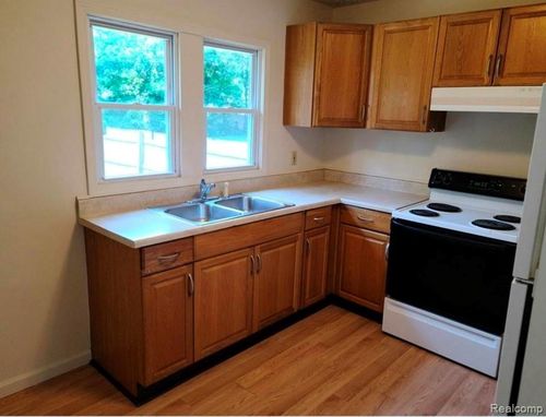 822 Isham St, Owosso, MI, 48867-4048 | Card Image