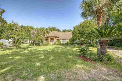 5120 Cedar St, House other with 3 bedrooms, 2 bathrooms and 2 parking in Gulf Breeze FL | Image 2