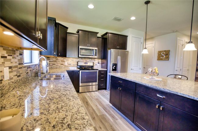 2583 Marton Oak Boulevard, House other with 3 bedrooms, 2 bathrooms and null parking in NORTH PORT FL | Image 14