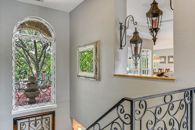 Entrance foyer featuring plenty of natural light and a textured wall | Image 8