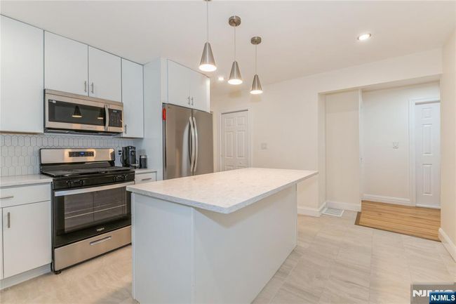 63 E Midland Ave, Home with 5 bedrooms, 3 bathrooms and null parking in Kearny NJ | Image 7
