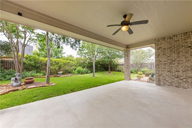 View of patio featuring a ceiling fan | Image 31