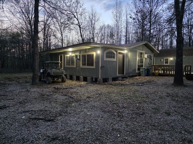 View of front of house featuring a deck | Image 4