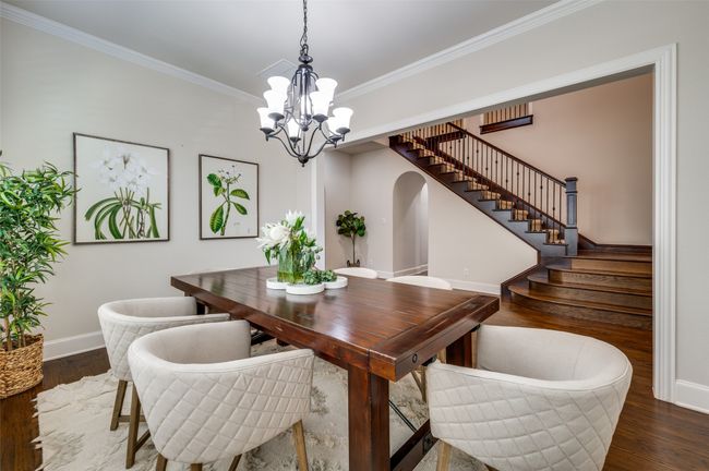 The oversized dining room is an ideal space for entertaining family and friends, offering plenty of room for gatherings and memorable meals. | Image 8
