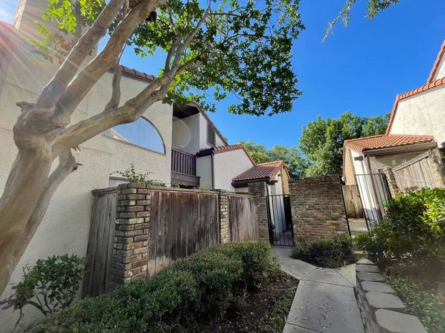 View of yard with a gate | Image 19