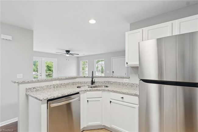 Kitchen overlooking Family Room | Image 8