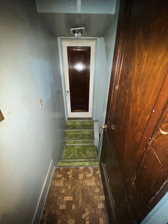 Entry level Common area stairs toward basement | Image 19