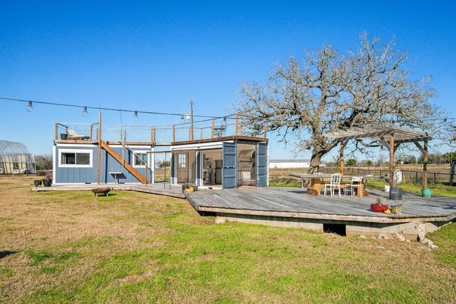 The entertaining area! Outdoor kitchen housed in a shipping container kitchen - 160 sq ft. Guest quarters (also a shipping container!) - 160 sq ft. Panoramic rooftop deck! | Image 26
