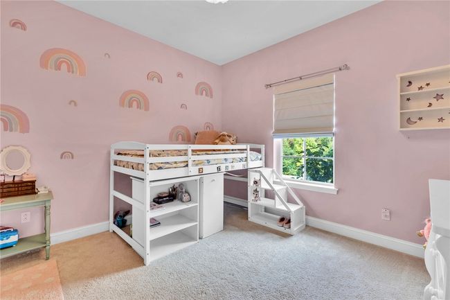 Bedroom overlooks the front yard. | Image 25