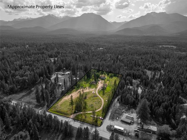 Aerial view of property and surrounding area with property boundaries highlighted | Image 25
