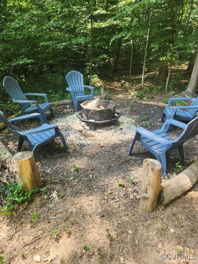 View of yard with a fire pit | Image 27