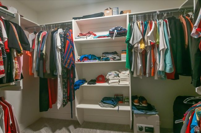 Walk in closet with carpet flooring | Image 21