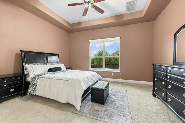 The primary bedroom is on the main floor and spacious. | Image 11