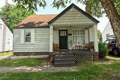 View of front of home featuring covered porch | Image 1