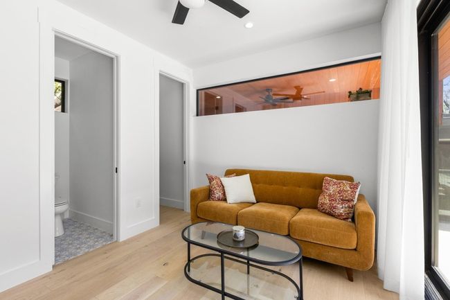 Living room featuring recessed lighting, baseboards, a ceiling fan, and wood finished floors | Image 35
