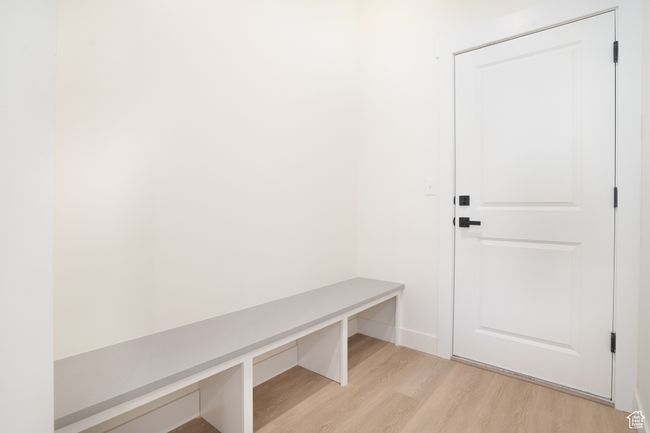 Mudroom featuring light wood-type flooring | Image 9