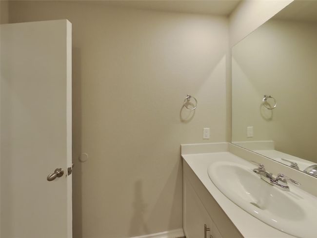 Bathroom with vanity and baseboards | Image 13