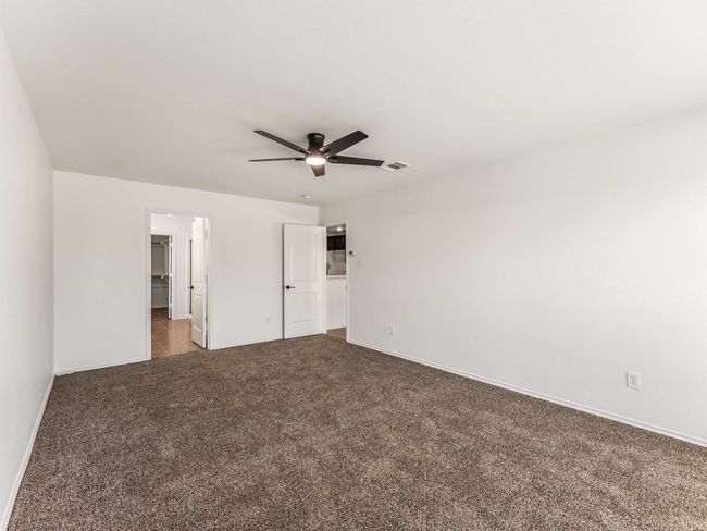 Unfurnished bedroom with carpet floors and ceiling fan | Image 19
