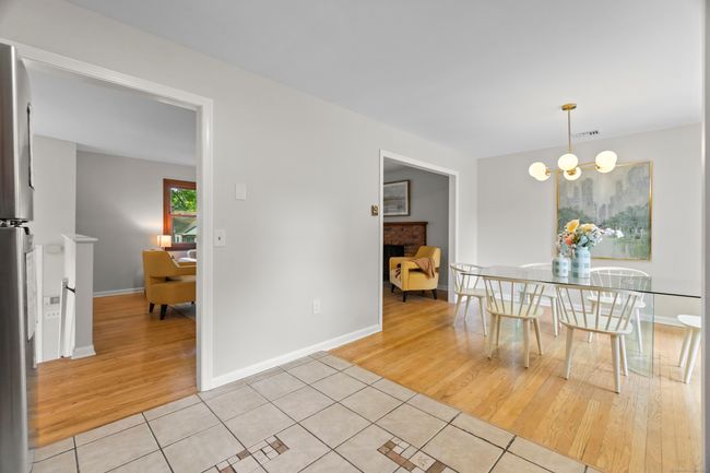 Kitchen into dining room with peeks of the living room | Image 11