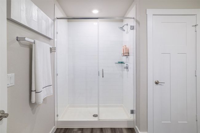 Primary Bathroom featuring a walk-in shower. | Image 19