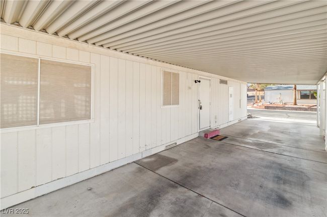 View of patio with a carport | Image 32